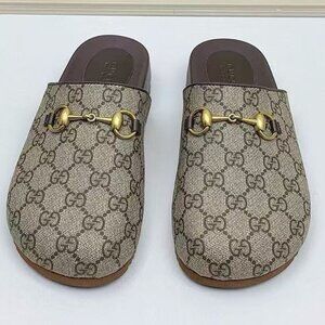 Gucci mule slippers in GG Supreme canvas